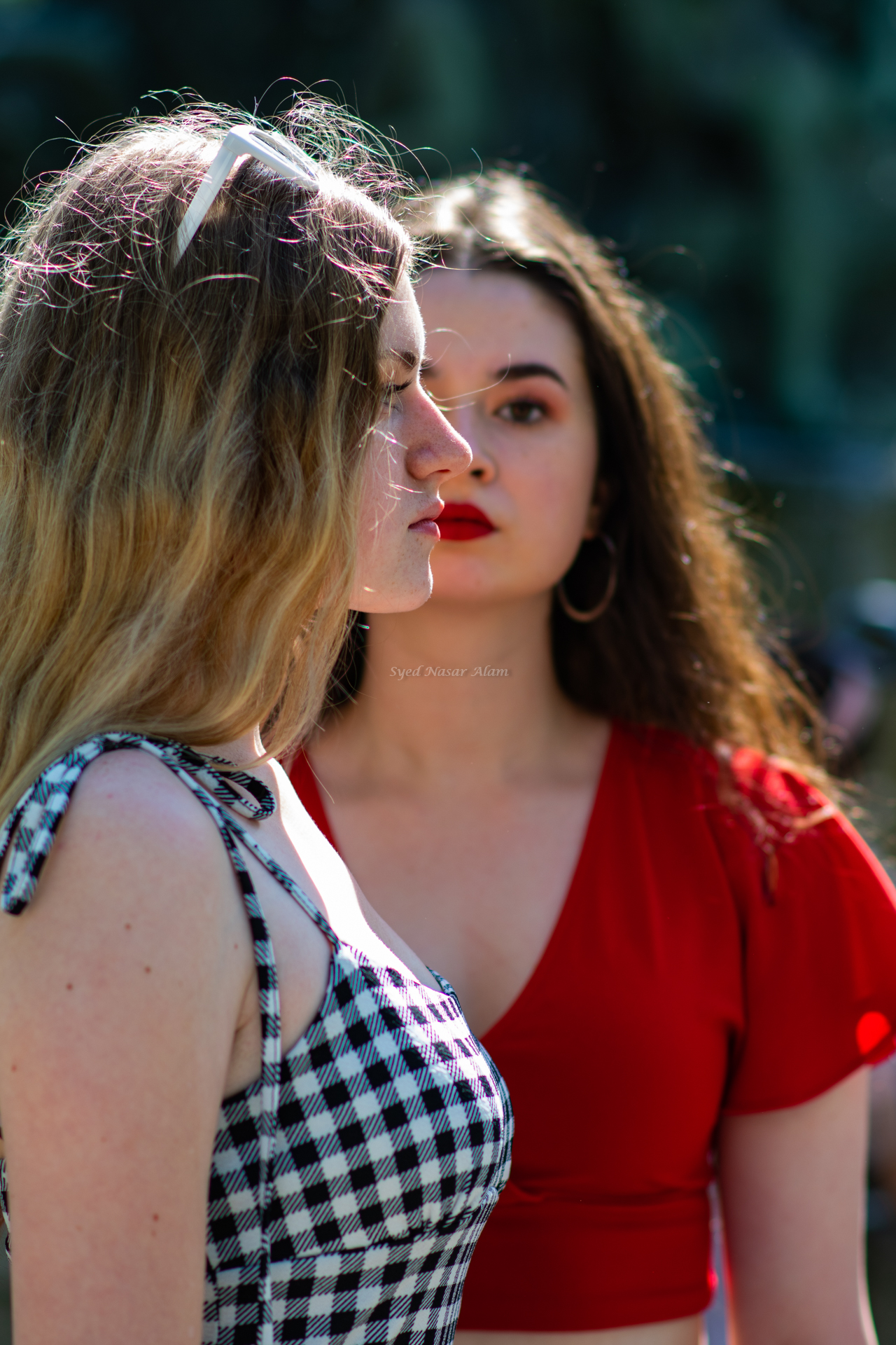 Two Girls Standing Symmetrically